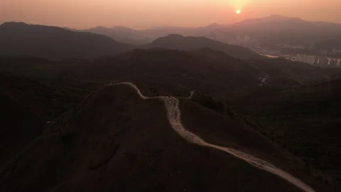 Peak view of bending trails on the hill in Wan Kok Sha Stock Footage 171970290