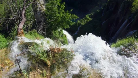 Peak of a waterfall, water flowing down a mountain Stock Footage 151114400