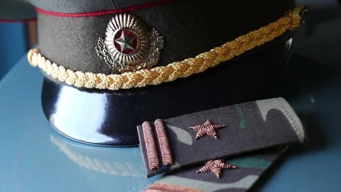 Peaked cap and epaulets Stock Footage 105504321