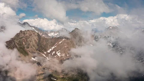 Peaks in Clouds. Timelapse 4k ProRes Stock Footage 161077519