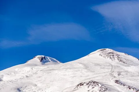 The peaks of Elbrus from the last station Stock Photos