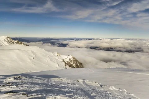 Peaks of mountains above the clouds Stock Footage 84723255