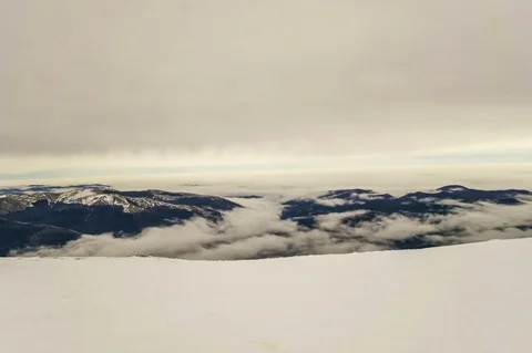 Peaks of mountains above the clouds Stock Footage 84723585