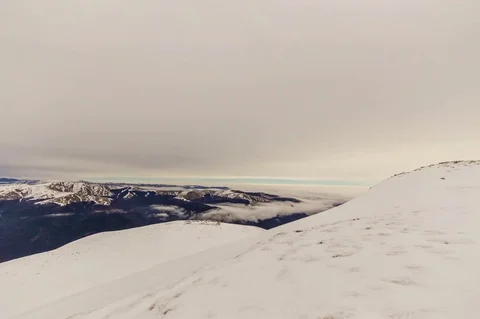 Peaks of mountains above the clouds Stock Footage 84724044