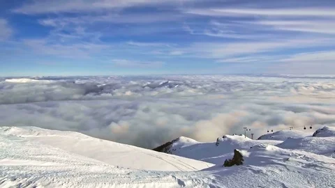 Peaks of mountains above the clouds Stock Footage 84775567