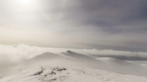 Peaks of mountains above the clouds Stock Footage 86290584