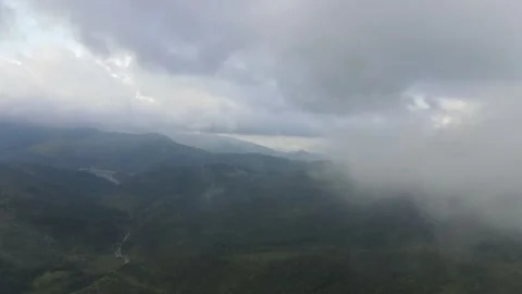 Peaks of mountains among dark clouds Video stock 137545376