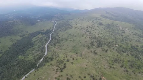 Peaks of mountains among rain clouds Video stock 137545419