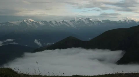 Peaks of the mountains at sunset Stock Footage 41465385