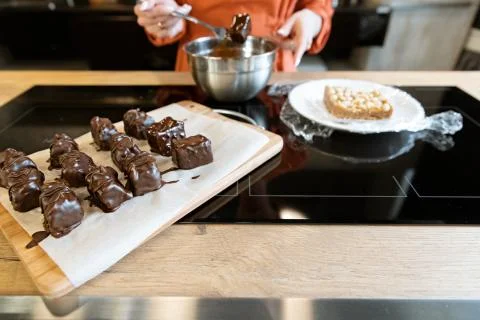 Peanut Bar Cooking Process in Chocolate Glaze Stock Photos