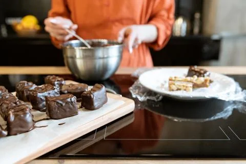 Peanut Bar Cooking Process in Chocolate Glaze Fotos de archivo