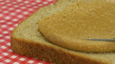 Peanut butter and bread, Slow Motion Stock Footage 15067925