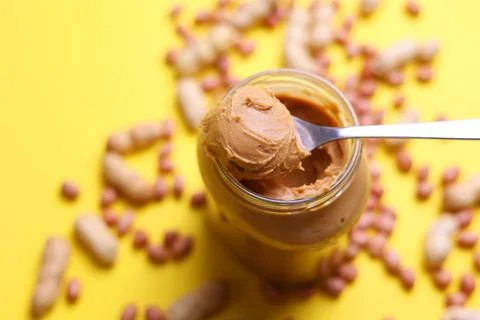 Peanut butter on a colored background Foto stock