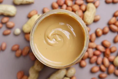 Peanut butter on a colored background Foto stock