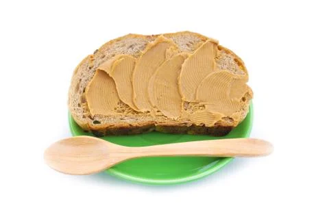 Peanut butter with wholegrain bread Stock Photos