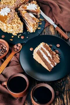 Peanut cake served with coffee, top view Stock Photos