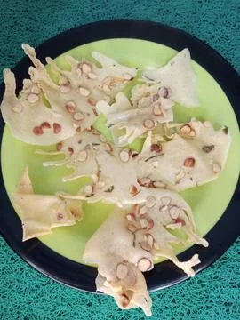 Peanut Crackers (Peyek) in Serving Container Stock Photos