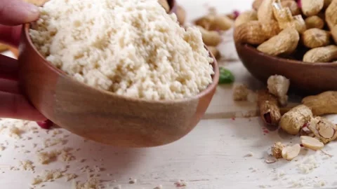 Peanut flour with whole nuts Stock Footage 169938175
