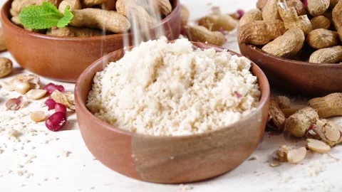 Peanut flour with whole nuts Stock Footage 169938180