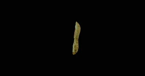 Peanut half rotating with black background Stock Footage 233575845
