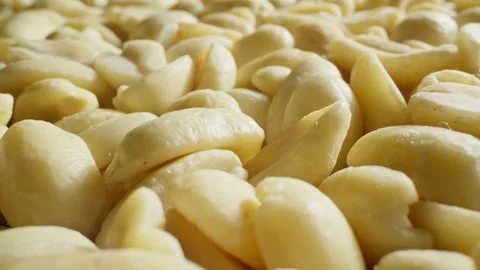 Peanut kernels. Pile of nuts. Healthy vegan food concept. Dolly slider shot. Stock Footage 289452490