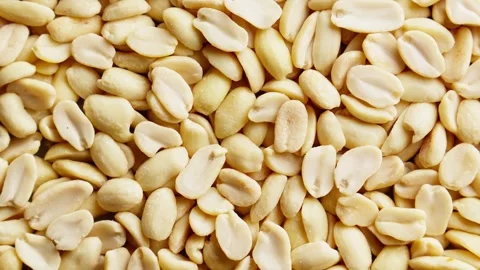 Peanut kernels rotating. Pile of nuts. Healthy vegan food concept. Dolly slider Stock Footage 291630807