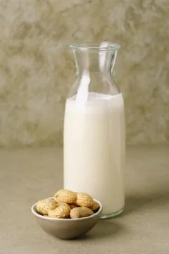 Peanut milk in a bottle Stock Photos