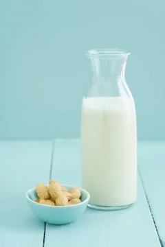 Peanut milk in a bottle Stock Photos