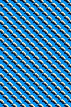 Peanut pattern on blue background, top view colorful food flat lay texture Stock Photos