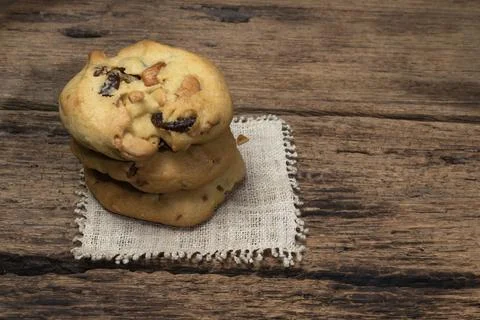 Peanut raisin cookies stack on wood table. Stock Photos