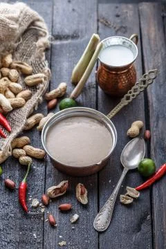 Peanut sauce prepare, rustic style with ingredients Stock Photos