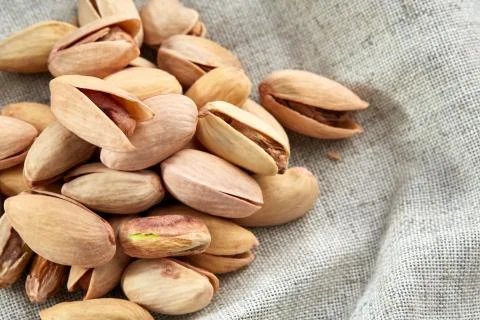 Peanut shells food background, close-up, shallow depth of field, macro. Stock Photos