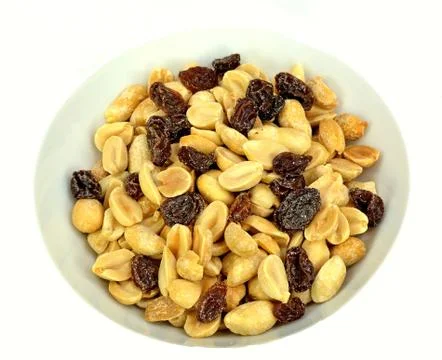 Peanuts and raisins Stock Photos