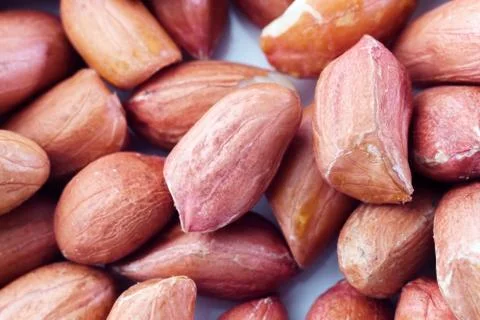 Peanuts for background and texture. peeled peanuts close up macro shot Stock Photos