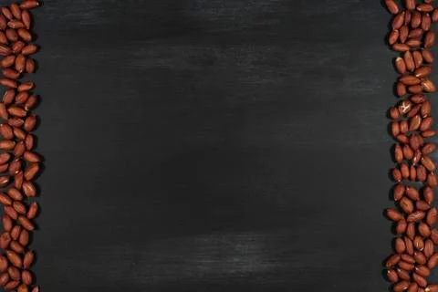 Peanuts on black chalkboard. Stock-Fotos
