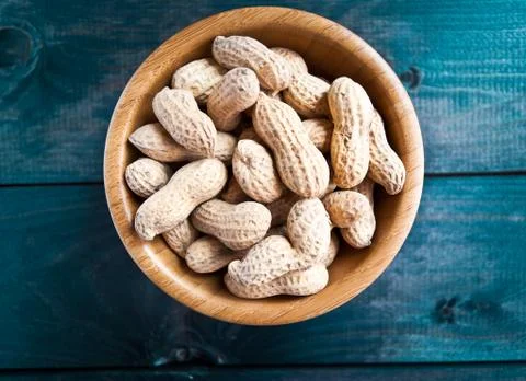 Peanuts in bowl Stock Photos