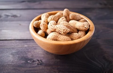 Peanuts in bowl Stock Photos