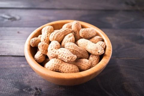 Peanuts in bowl Stock Photos