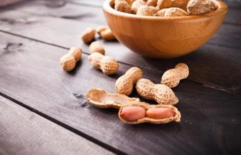Peanuts in bowl Stock Photos