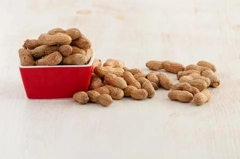 Peanuts in bowl Stock Photos