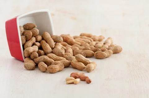 Peanuts in bowl Stock Photos