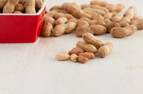 Peanuts in bowl Stock Photos