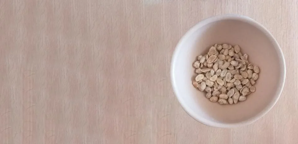 Peanuts in a bowl Stock Photos