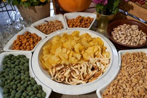 Peanuts, chips, nuts, snacks for beer, buffet 写真素材