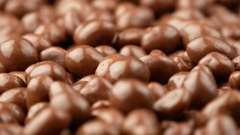 Peanuts in chocolate, dolly shot. Stock Footage 148295580