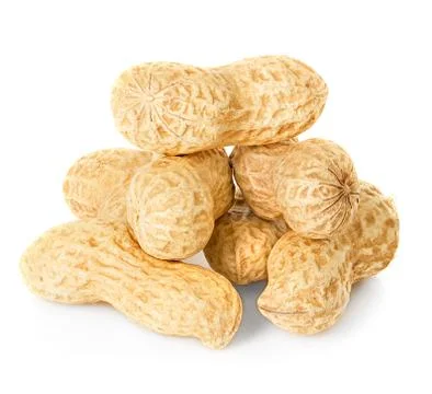 Peanuts close-up isolated on a white background. Stock Photos
