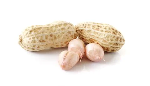 Peanuts close up isolated on white background Stock Photos