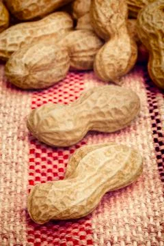 Peanuts with colored cloth Stock Photos