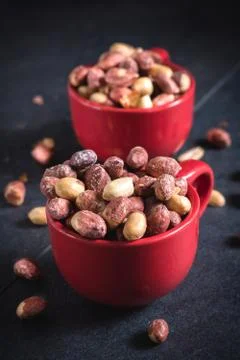 Peanuts in the cups Stock Photos