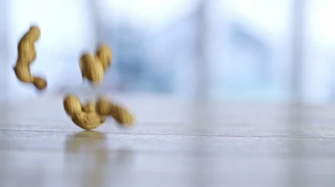 Peanuts Falling Down, Dolly Shot Stock Footage 46710998